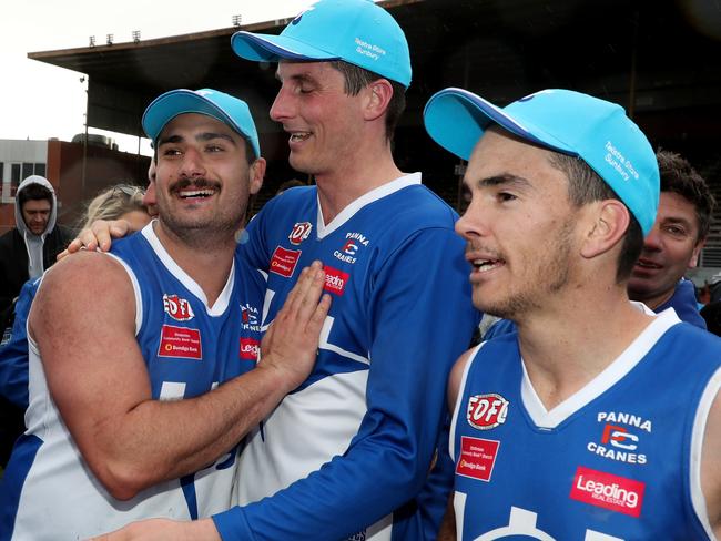 Sunbury Kangaroos players celebrate their premiership. Picture: Mark Dadswell