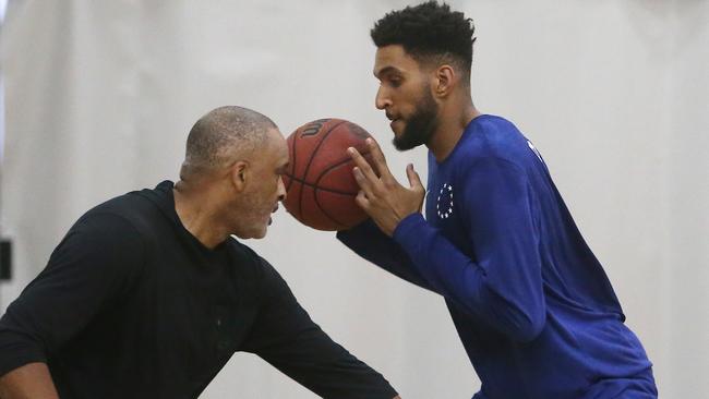 Phil Handy working out with Jonah Bolden. Picture: Yuri Kouzmin