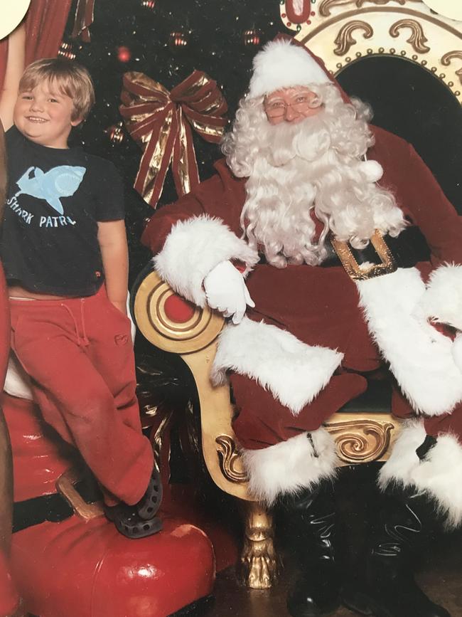 Melanie Blair: This is my son Josh , he didn’t want to get to close to Santa. Poor Santa had to lean over to get in the shot.