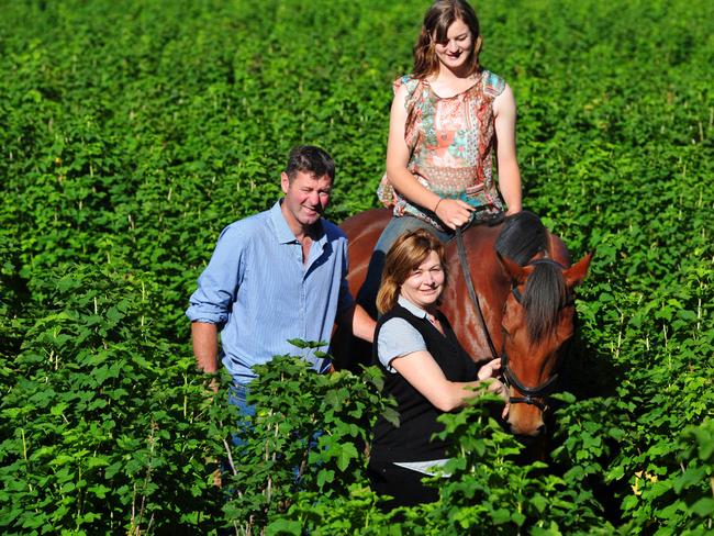 Mark and Jacoba Trump at their Silvan farm with daughter Ella.