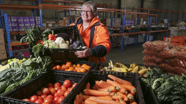 Warehouse manager Heidi Britz at Avocare, one of 37 Victorian charities to receive a Feed Melbourne Appeal grant this year. Picture: Wayne Taylor