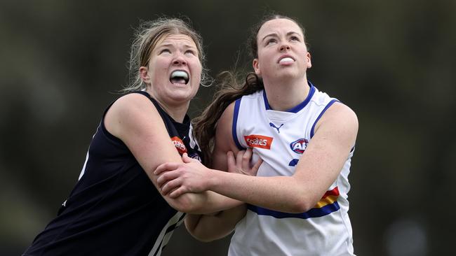 Hayley Peck knocked off Sara Howley. Picture: Martin Keep/AFL Photos/via Getty Images