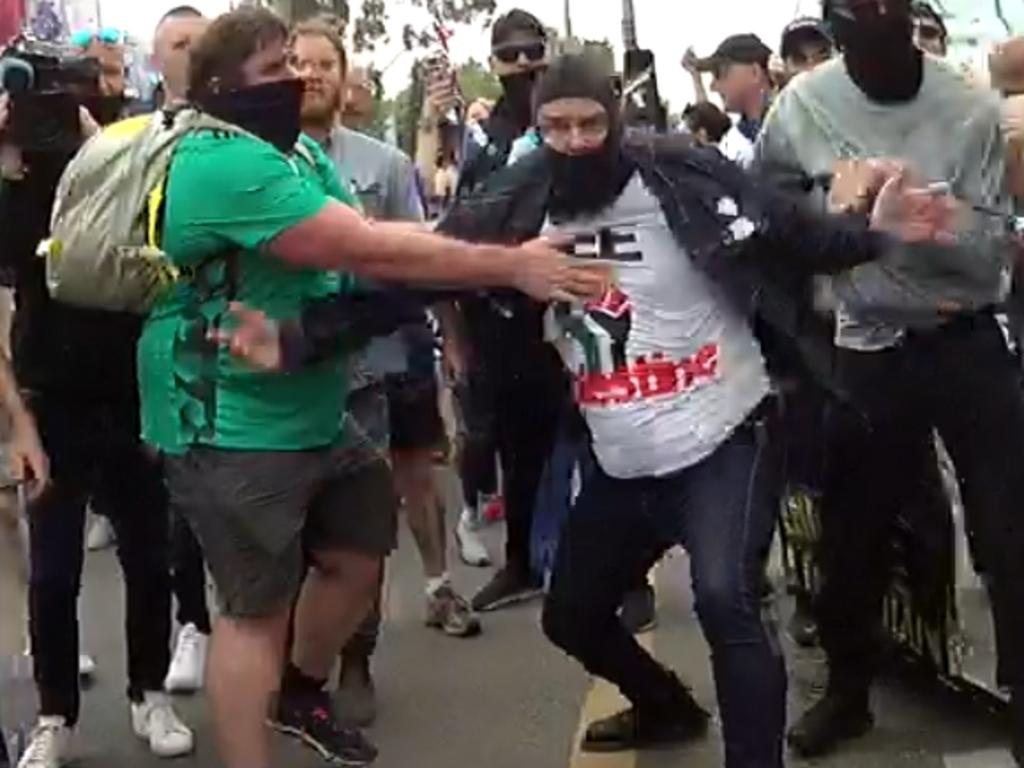 Dramatic footage has emerged of Melbourne man Dennis Basic, who attacked a police officer’s horse with a flagpole during an anti-lockdown rally. Picture: NCA NewsWire
