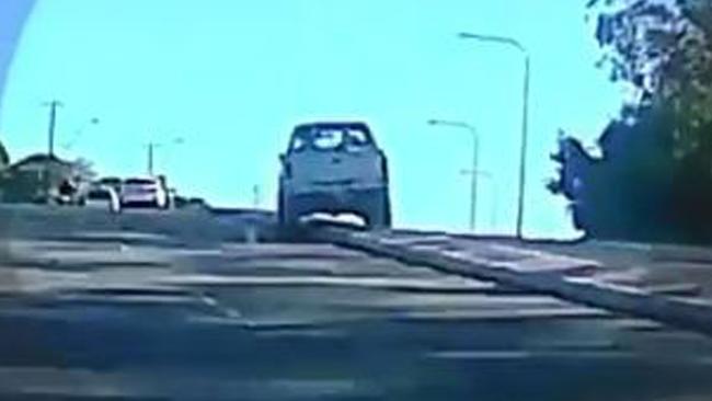 The ute seen crossing a median strip as Dreier attempted to escape police.