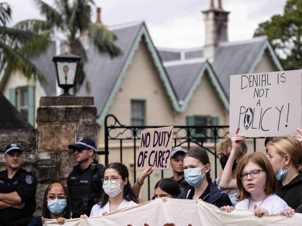 Protesters stood on the doorstep of the PM’s Sydney residence at Kirribilli House to demand climate action. Picture: NCA NewsWire / James Gourley