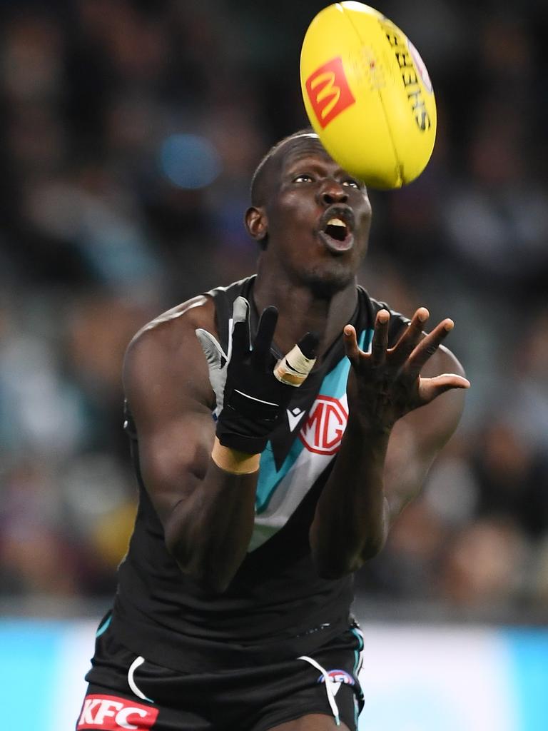 Aliir Aliir takes a chest mark. Picture: Mark Brake/Getty Images