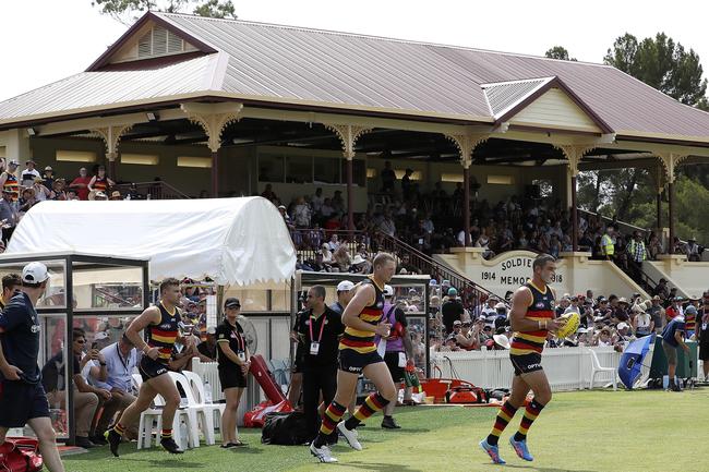 Taylor Walker leads the Adelaide Crows out onto Memorial Oval for the JLT Series clasj between Crows and Port Adelaide at Port Pirie. Picture SARAH REED