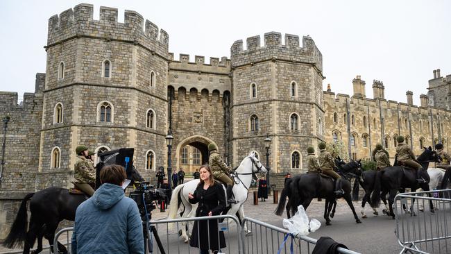 Media teams broadcast live with reports on Prince Philip, Duke of Edinburgh, from outside Windsor Castle. Picture: Getty