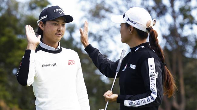 Minjee Lee and Min Woo Lee high five ahead of the Australian Open Picture: Getty Images