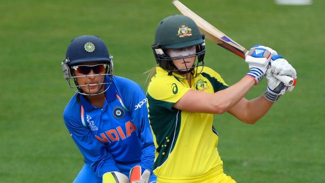 India wicketkeeper Sushma Verma looks on as Australian batter Ellyse Perry hits out during the ICC Women's World Cup.