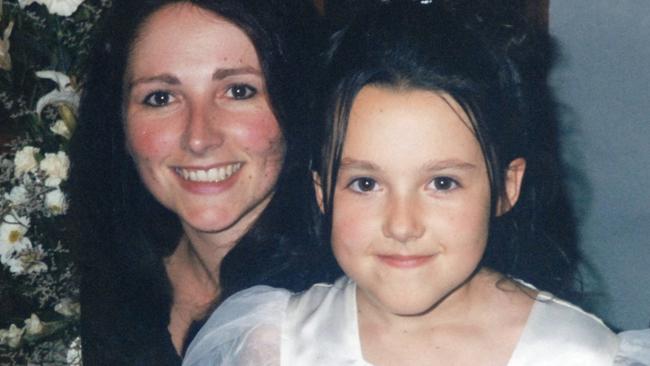 Sonya Ryan on her wedding day with her daughter, Carly Ryan, dressed as flower girl.