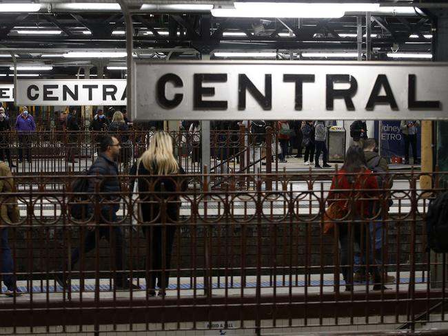 Commuters wait on the platforms at Central Station during the Train strike. Picture: John Appleyard