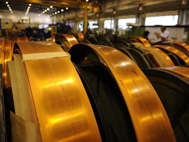 Rolls of ___ copper, which is used to make copper busbars in electrical systems (?), in the Luvata plant in Johor, Malaysia, on Monday, May 13, 2013. Photographer: Munshi Ahmed/Bloomberg