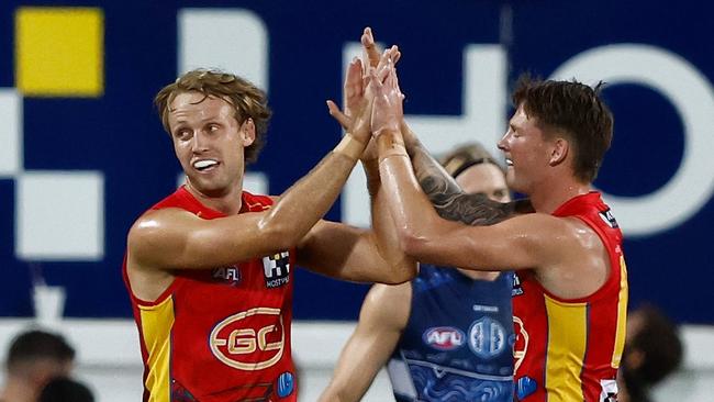 Jack Lukosius (left) and Bailey Humphrey of the Suns. (Photo by Michael Willson/AFL Photos via Getty Images)
