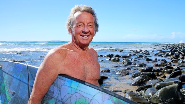 Alby Falzon gets up an hour before sunrise to write every morning and says surfing makes his life very happy. Pic Nathan Edwards