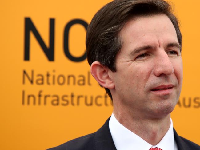 Federal Minister for Education and Training Simon Birmingham is seen during a press conference with Federal Minister for Jobs and Innovation Michaelia Cash, Australian Chief Scientist Alan Finkel and Federal Member for Boothby Nicole Flint during a tour of the Waite Campus of the Adelaide University in Adelaide, Tuesday, May 15, 2018. Institutions researching cancer, cyber security and management of the Great Barrier Reef will benefit from $1.9 billion in federal government infrastructure funding. Education Minister Simon Birmingham says the Research Investment Strategy responds to recommendations made by scientists, including Australia?s Chief Scientist Alan Finkel. (AAP Image/Kelly Barnes) NO ARCHIVING