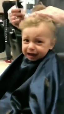 Entire barbershop sings to baby