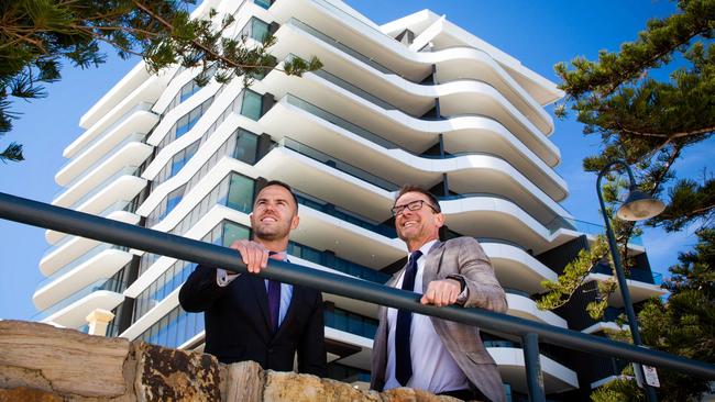 Chasecrown founder and director Louis Kanellos (right) with Medallion Homes chief executive Jordan Katelanis in front of their $83m Eight South Esplanade apartments project at Glenelg. Picture: Supplied