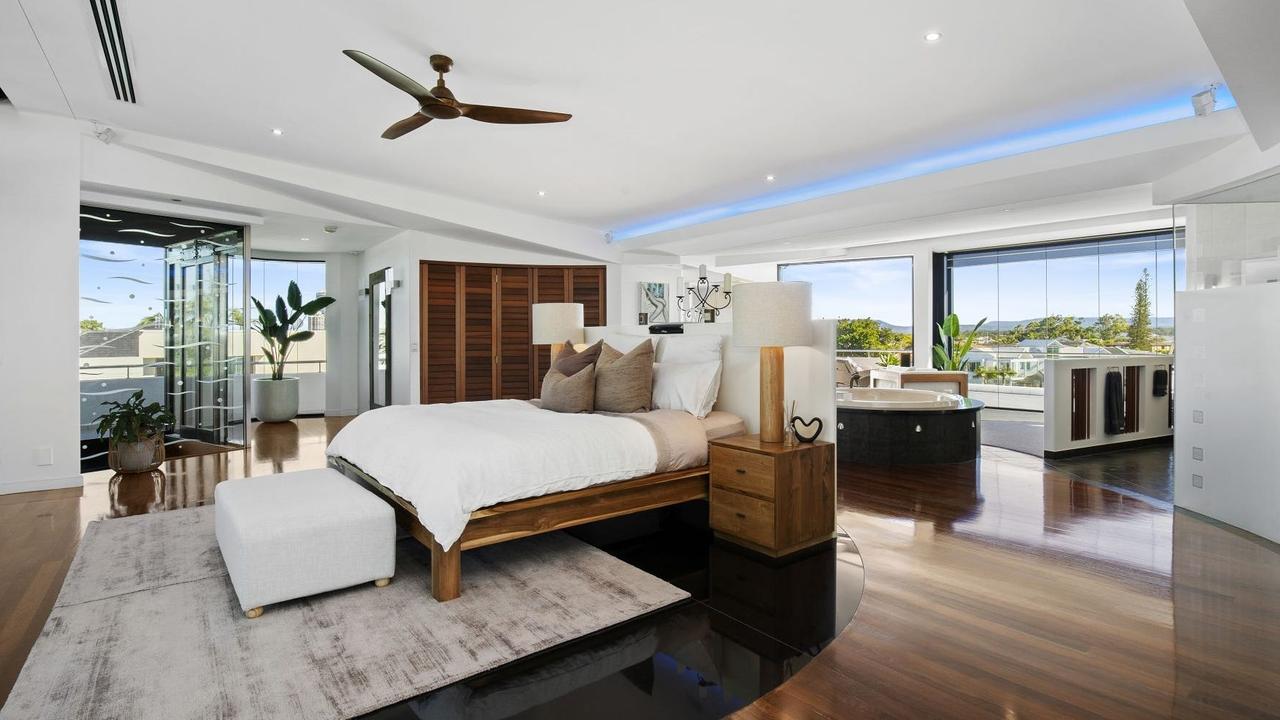 The huge open plan master bedroom.