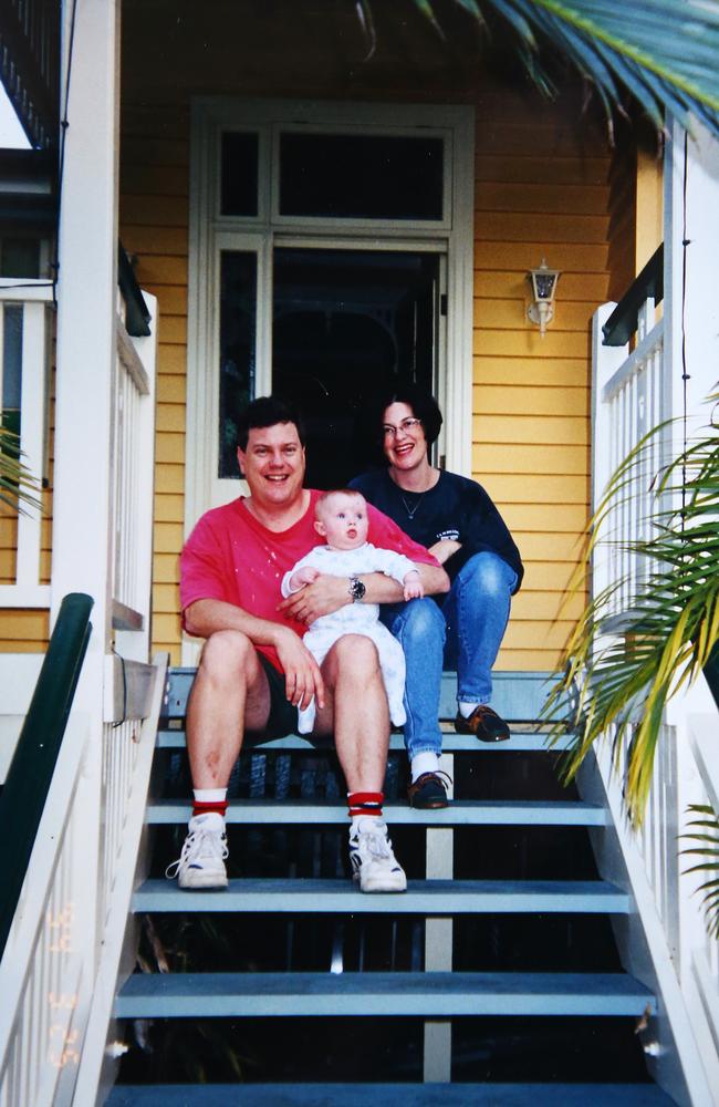 The growing Nicholls family on their front stairs