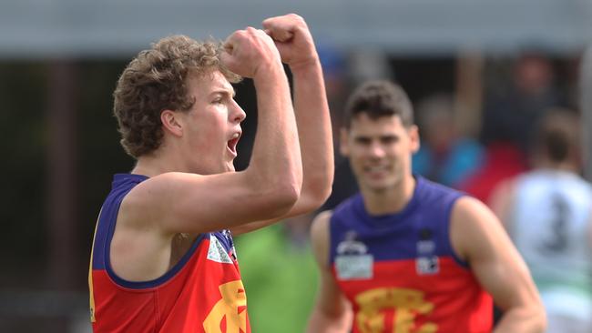 Ted Clayton pumps his firsts to celebrate a goal in Fitzroy’s premiership win. Picture: David Crosling