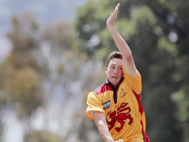 Andrew Perrin sends one down for University of Tasmania. Picture: Patrick Gee