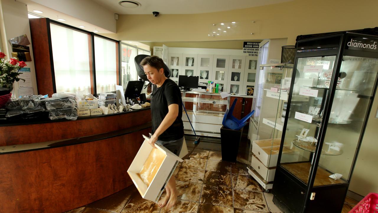 The streets of Lismore including the CBD have been inundated with floodwater after the Wilson River overtopped the flood levee. Anet Michel starts the clean up at Diamonds + Jewerlry store in Woodlark st in the CBD of Lismore. Picture: Nathan Edwards