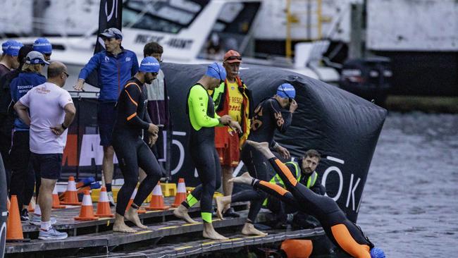 Participants enter the water for the swimming section of the Ironman 70.3 Tasmania in Hobart on Sunday 4th February. Picture: Linda Higginson