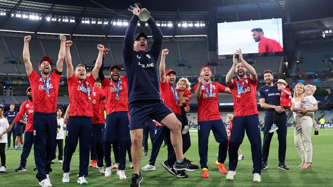 Matthew Mott celebrates with his team. Photo by Cameron Spencer/Getty Images