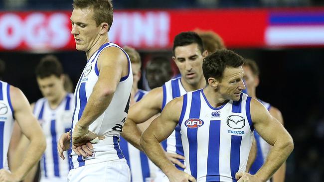 Drew Petrie, Brent Harvey and Michael Firrito after a loss. Picture: George Salpigtidis