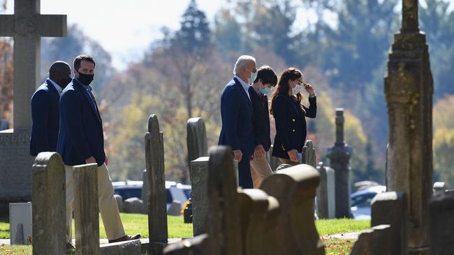 Joe Biden, centre, arrives at St. Joseph on the Brandywine Roman Catholic Church in Wilmington, Delaware on Monday (AEDT). Picture: AFP