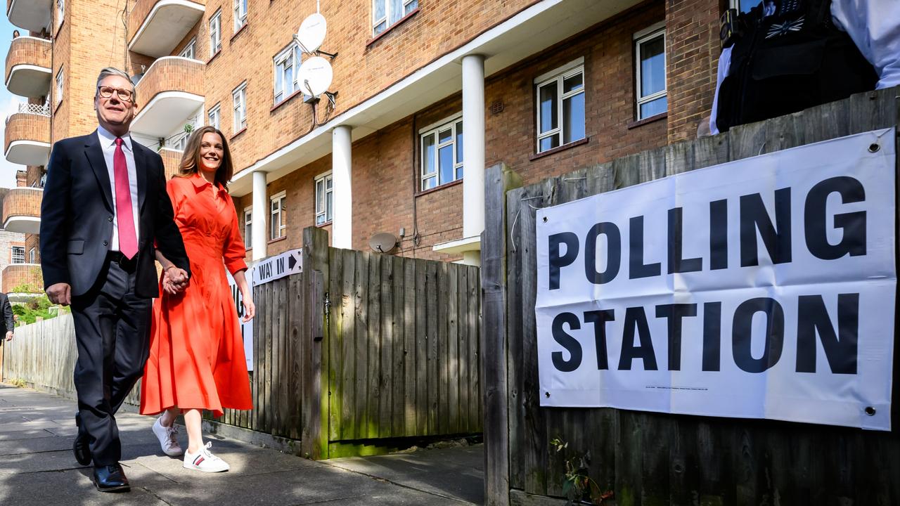 Leader of the Labour Party Keir Starmer walks with his wife Victoria Starmer, as they arrive at a polling station. (Photo by Leon Neal/Getty Images)