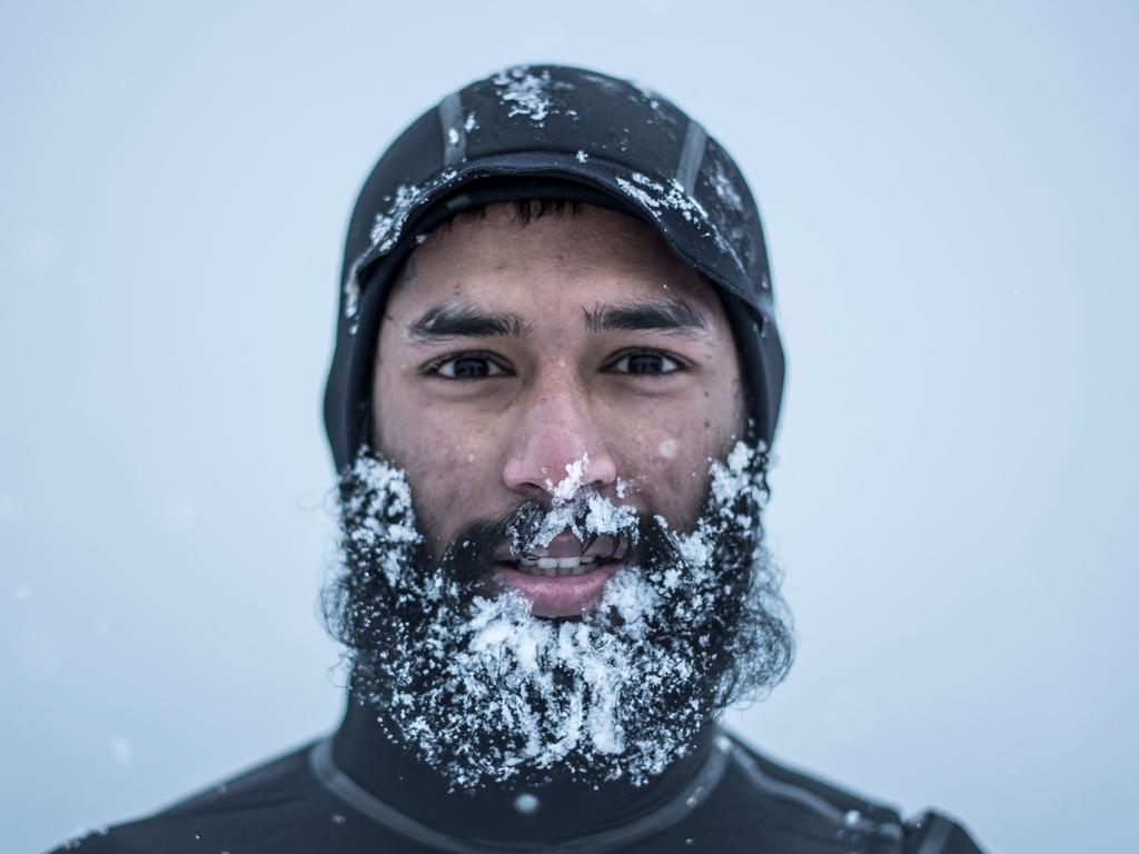 Leela Krischna from India poses after a surf session, on March 11, 2018 in Unstad northern Norway, Lofoten islands, within the Arctic Circle as air temperature drops minus 13°C and water temperature above 4°C. Picture: AFP