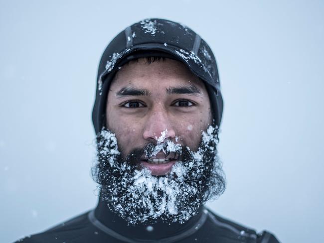 Leela Krischna from India poses after a surf session, on March 11, 2018 in Unstad northern Norway, Lofoten islands, within the Arctic Circle as air temperature drops minus 13°C and water temperature above 4°C. Picture: AFP