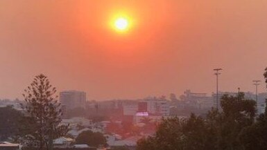 The smoke hazeover Brisbane on Monday evening.