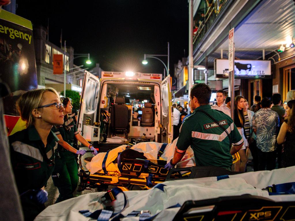 Paramedics attend to people needing help in Hindley St just after midnight, New Year’s Day, 2020. Picture: AAP / Morgan Sette