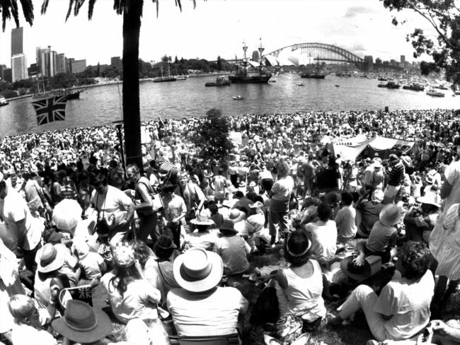 Crowds pack foreshores of Sydney Harbour at Farm Cove to see arrival of tall ships in re-enactment of First Fleet on 26/01/88 for Bicentennial.