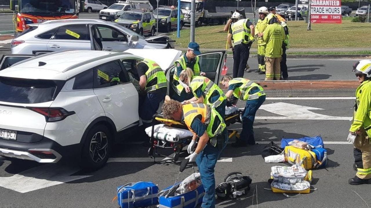 Emergency services rushed to the scene after the serious crash on Maroochydore and Main Rd. Photo: David Brzeski