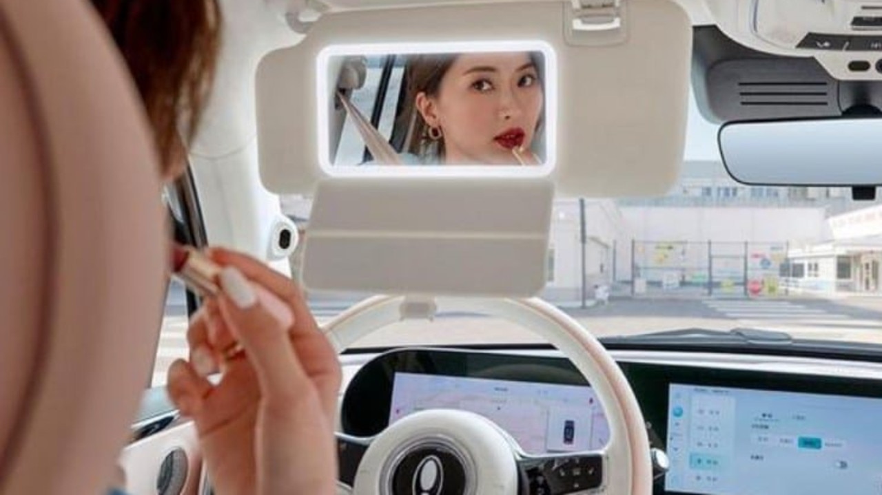 The car has oversized vanity mirrors.