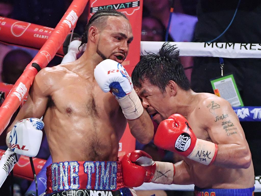 Keith Thurman (L) and Manny Pacquiao battle in the 10th round of their WBA welterweight title fight at MGM Grand Garden Arena on July 20, 2019 in Las Vegas, Nevada. Pacquiao won in a split decision. (Photo by Ethan Miller/Getty Images)