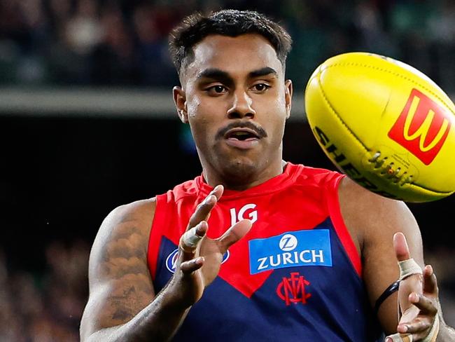 MELBOURNE, AUSTRALIA - AUGUST 23: Kysaiah Pickett of the Demons gathers the ball during the 2024 AFL Round 24 match between the Melbourne Demons and the Collingwood Magpies at The Melbourne Cricket Ground on August 23, 2024 in Melbourne, Australia. (Photo by Dylan Burns/AFL Photos via Getty Images)