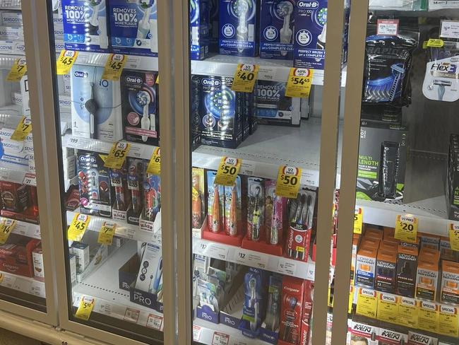 Hygiene items are now behind a cabinet at a Coles store in Melbourne's west.