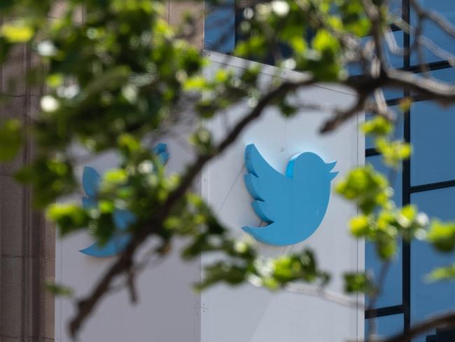 (FILES) In this file photo taken on April 26, 2022, the Twitter logo is seen at their headquarters in downtown San Francisco, California. - Twitter on May 19, 2022 said it will put warning labels on demonstrably false posts about Russia's war in Ukraine under a new "crisis misinformation policy." (Photo by Amy Osborne / AFP)