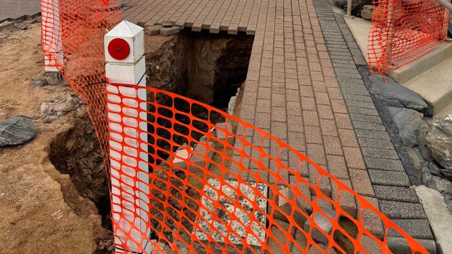 On Thursday night, the City of Holdfast Bay said the council's engineering team was investigating the extent of damage with a large section currently fenced off. Picture: City of Holdfast Bay