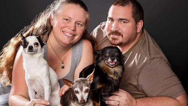 Laura and Ben Clark with their three dogs Milo, Shadow and Gizmo. Picture – contributed.