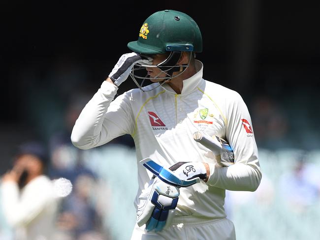 Australian batsman Peter Handscomb departs after being dismissed for 12.