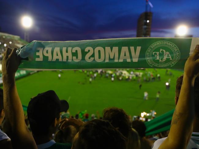 Fans pay tribute to the players of Brazilian team Chapecoense Real at the club's Arena Conda stadium. Picture: Buda Mendes/Getty Images