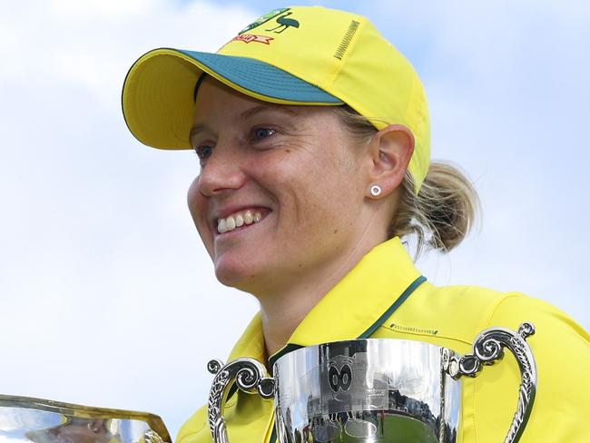 WELLINGTON, NEW ZEALAND - DECEMBER 23: Alyssa Healy of Australia poses with the Rose Bowl and series trophy after winning game three of the Women's ODI series between New Zealand and Australia at Basin Reserve, on December 23, 2024, in Wellington, New Zealand. (Photo by Hagen Hopkins/Getty Images)