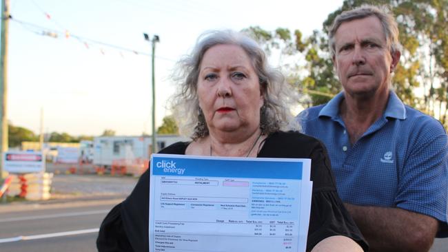 Cheryl and Richard Perkins with the bill that includes the electricity bill that included the charge that should have gone to the council's contractor. Picture: Ellen-Maree Elliot