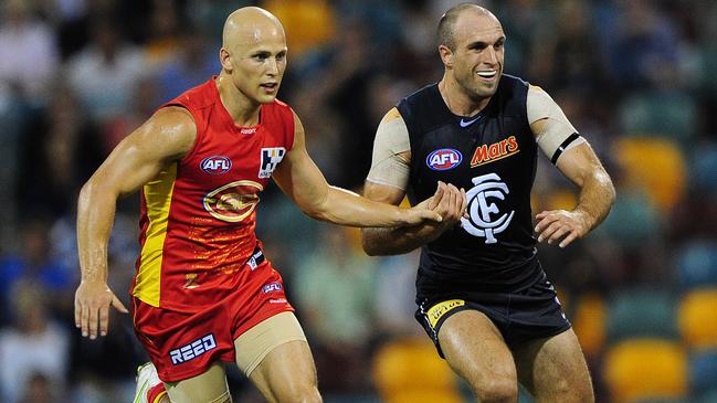 Ablett Jr and Chris Judd go head to head.